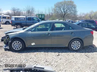 2012 Toyota Camry L z VIN 4T4BF1FK9CR229751, wystawiony jako IAAI lot #42190311 z przebiegiem 105 955 mil mil oraz . Historia ofert i sprzedaży dostępna na DreamBid. Obrazek 15.