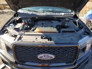 2018 Ford F-150 XL with VIN 1FTEW1EP2JFA60621, listed as a Copart auction lot 45009925 with 125,731 mi miles and Salvage title. Bid and sale history available at DreamBid. Image 11.