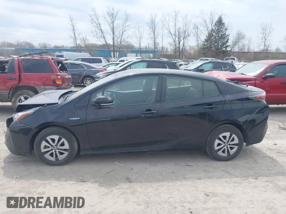 2017 Toyota Prius Two with VIN JTDKARFUXH3041931, listed as a IAAI auction lot 42075004 with 75,768 mi miles and . Bid and sale history available at DreamBid. Image 14.