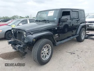 2008 Jeep Wrangler Unlimited Sahara с VIN 1J4GA59188L624010, выставлен на аукционе IAAI как лот 42115574 с пробегом 105 800 миль миль и . История ставок и продаж доступна на DreamBid. Изображение 18.