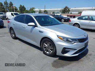 2019 Kia Optima LX z VIN 5XXGT4L34KG340899, wystawiony jako IAAI lot #42445116 z przebiegiem 118 188 mil mil oraz . Historia ofert i sprzedaży dostępna na DreamBid. Obrazek 1.