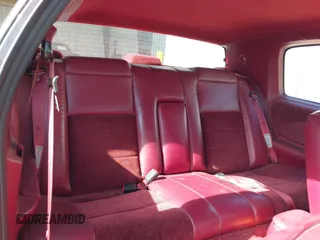 1994 Mercury Cougar z VIN 1MELM62W6RH604333, wystawiony jako IAAI lot #42406748 z przebiegiem 92 504 mil mil oraz . Historia ofert i sprzedaży dostępna na DreamBid. Obrazek 8.