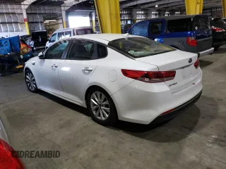 2016 Kia Optima LX with VIN 5XXGT4L30GG002858, listed as a Copart auction lot 74230034 with 83,651 mi miles and Salvage title. Bid and sale history available at DreamBid. Image 2.
