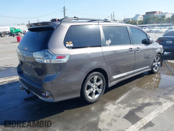 2012 Toyota Sienna SE with VIN 5TDXK3DCXCS233593, listed as a IAAI auction lot 41959611 with 85,558 mi miles. Bid and sale history available at carsss.com. Image 4.