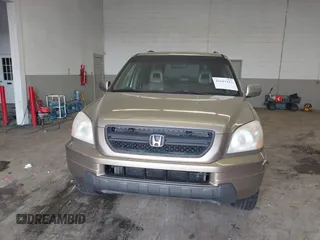 2005 Honda Pilot EX-L with VIN 5FNYF18565B019345, listed as a IAAI auction lot 41641423 with 282,099 mi miles. Bid and sale history available at carsss.com. Image 12.