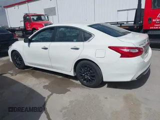 2016 Nissan Altima SR with VIN 1N4AL3AP0GC223999, listed as a IAAI auction lot 41838999 with 159,918 mi miles and . Bid and sale history available at carsss.com. Image 3.