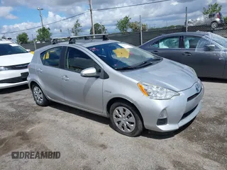2014 Toyota Prius One z VIN JTDKDTB3XE1065347, wystawiony jako IAAI lot #42254297 z przebiegiem 215 768 mil mil oraz . Historia ofert i sprzedaży dostępna na DreamBid. Obrazek 1.