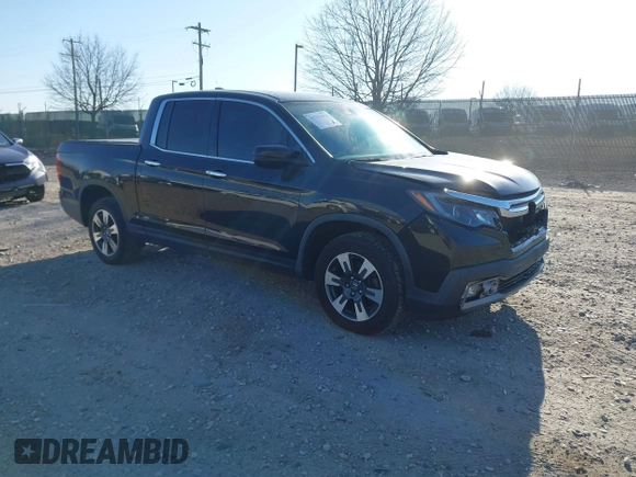 2019 Honda Ridgeline RTL-E with VIN 5FPYK3F7XKB033652, listed as a IAAI auction lot 41751421 with 96,774 mi miles and . Bid and sale history available at DreamBid. Image 1.