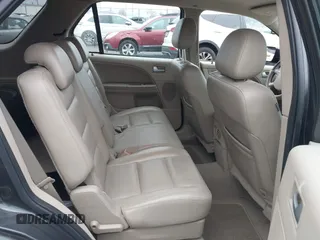2007 Ford Freestyle SEL with VIN 1FMDK02147GA05314, listed as a IAAI auction lot 41504606 with 241,021 mi miles. Bid and sale history available at carsss.com. Image 8.