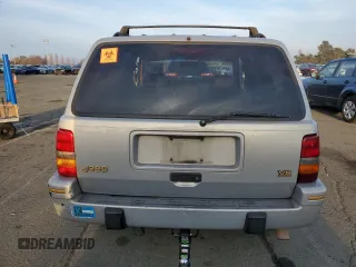 1995 Jeep Grand Cherokee Limited with VIN 1J4GZ78Y2SC603292, listed as a Copart auction lot 84449764 with 153,673 mi miles and Non Repairable. Bid and sale history available at carsss.com. Image 6.