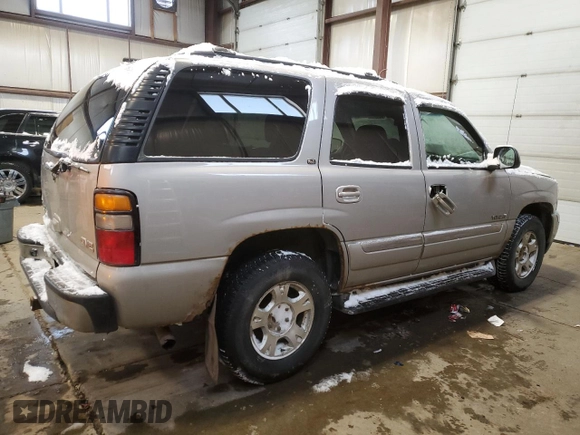 2006 GMC Yukon SLT with VIN 1GKEK13T76J149735, listed as a Copart auction lot 43025715 with 304,493 mi miles and Salvage Title. Bid and sale history available at carsss.com. Image 3.