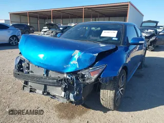 2014 Scion tC with VIN JTKJF5C78E3079618, listed as a IAAI auction lot 41107330 with 112,105 mi miles. Bid and sale history available at carsss.com. Image 18.