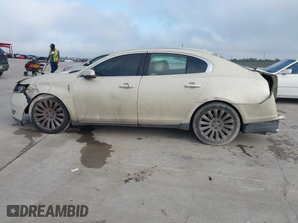2015 Lincoln MKS with VIN 1LNHL9DKXFG607951, listed as a IAAI auction lot 40807752 with 207,097 mi miles. Bid and sale history available at carsss.com. Image 13.