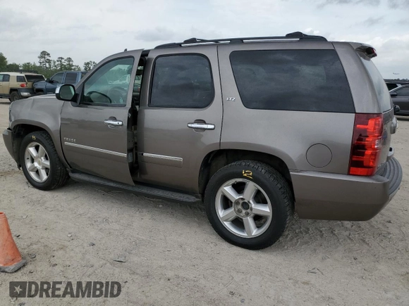 2012 Chevrolet Tahoe LTZ z VIN 1GNSCCE02CR259655, wystawiony jako Copart lot #55184505 z przebiegiem 199 189 mil mil oraz Szkoda całkowita • Salvage title. Historia ofert i sprzedaży dostępna na DreamBid. Obrazek 2.