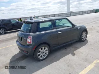 2013 MINI Hardtop S with VIN WMWSV3C59DT394005, listed as a IAAI auction lot 42028362 with 73,510 mi miles and . Bid and sale history available at DreamBid. Image 4.