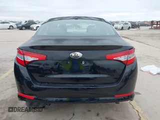 2012 Kia Optima Hybrid with VIN KNAGM4AD8C5021615, listed as a IAAI auction lot 41216697 with 119,153 mi miles. Bid and sale history available at carsss.com. Image 17.