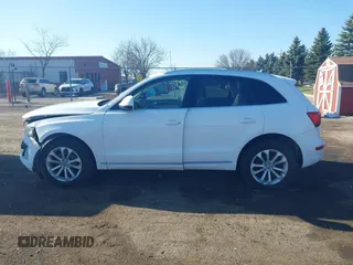 2014 Audi Q5 Premium Plus with VIN WA1LFAFP3EA106931, listed as a IAAI auction lot 41933150 with 140,104 mi miles and . Bid and sale history available at DreamBid. Image 14.