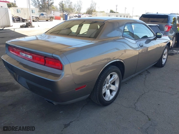 2011 Dodge Challenger with VIN 2B3CJ4DG0BH515573, listed as a IAAI auction lot 41861915 with 133,199 mi miles. Bid and sale history available at carsss.com. Image 4.
