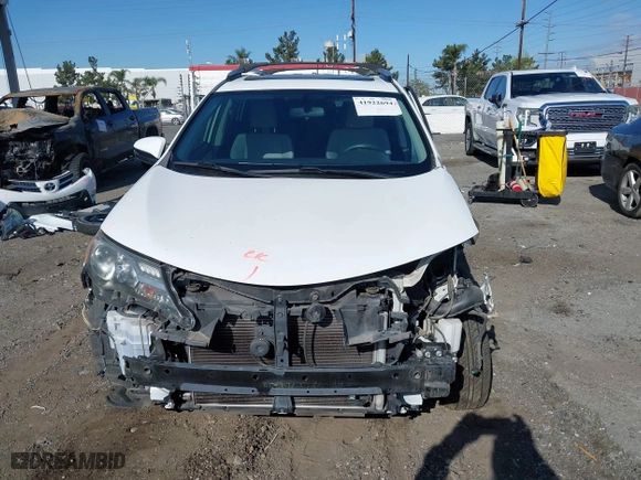 2015 Toyota RAV4 XLE with VIN JTMWFREV9FJ034992, listed as a IAAI auction lot 41922694 with 100,956 mi miles. Bid and sale history available at carsss.com. Image 13.