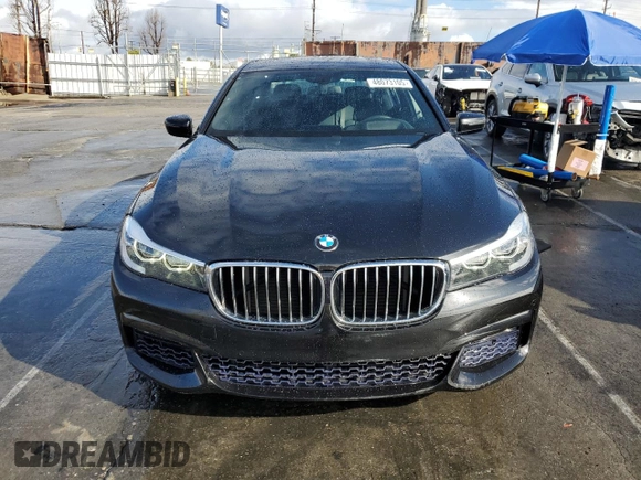 2017 BMW 7 Series 740i with VIN WBA7E2C59HG739788, listed as a Copart auction lot 48073105 with 36,274 mi miles and Salvage Title. Bid and sale history available at carsss.com. Image 5.