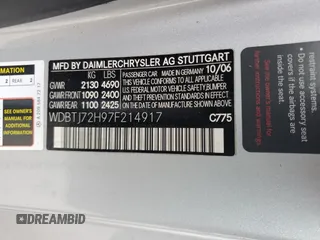 2007 Mercedes-Benz CLK 550 with VIN WDBTJ72H97F214917, listed as a Copart auction lot 73154374 with 110,017 mi miles and Salvage Title. Bid and sale history available at DreamBid. Image 12.