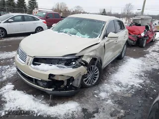 2016 Lincoln MKX Select with VIN 2LMTJ8KR0GBL38074, listed as a IAAI auction lot 41635344 with 96,239 mi miles. Bid and sale history available at carsss.com. Image 17.