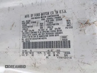 2002 Mazda B-Series 2WD Truck SX with VIN 4F4YR12D42TM18276, listed as a IAAI auction lot 41723184 with 142,623 mi miles. Bid and sale history available at carsss.com. Image 9.