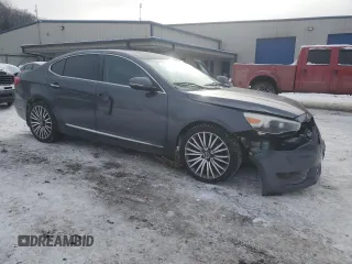 2014 Kia Cadenza Premium with VIN KNALN4D74E5128214, listed as a Copart auction lot 87692675 with 159,014 mi miles and Salvage Title. Bid and sale history available at carsss.com. Image 4.