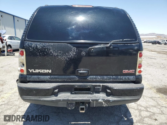 2002 GMC Yukon Denali z VIN 1GKEK63U62J241161, wystawiony jako Copart lot #58350085 z przebiegiem Nie podano mil oraz Szkoda całkowita • Salvage title. Historia ofert i sprzedaży dostępna na DreamBid. Obrazek 6.