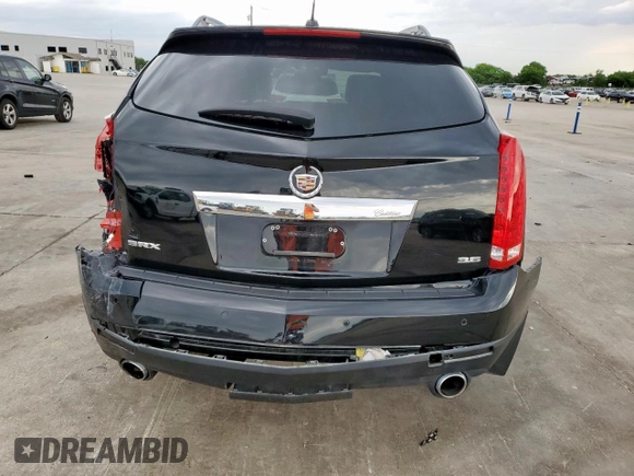 2015 Cadillac SRX Premium Collection z VIN 3GYFNDE33FS574125, wystawiony jako Copart lot #55530575 z przebiegiem 76 956 mil mil oraz Szkoda całkowita • Salvage title. Historia ofert i sprzedaży dostępna na DreamBid. Obrazek 6.