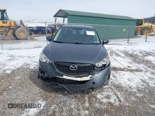 2013 Mazda CX-5 Sport z VIN JM3KE2BE9D0156274, wystawiony jako IAAI lot #41624466 z przebiegiem 159 017 mil mil oraz . Historia ofert i sprzedaży dostępna na DreamBid. Obrazek 12.