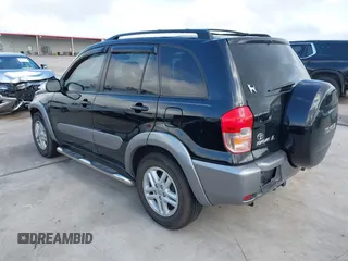 2001 Toyota RAV4 with VIN JTEGH20V910029962, listed as a IAAI auction lot 42092441 with 148,966 mi miles and . Bid and sale history available at DreamBid. Image 3.