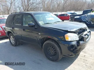 2005 Mazda Tribute S with VIN 4F2YZ06165KM39949, listed as a IAAI auction lot 41796476 with 270,492 mi miles and . Bid and sale history available at carsss.com. Image 1.
