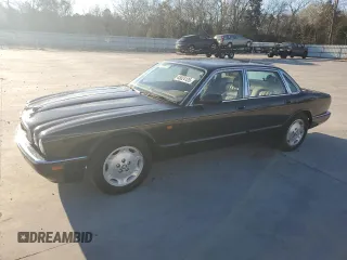 1997 Jaguar XJ with VIN SAJHX1245VC805665, listed as a Copart auction lot 45024125 with Not provided miles and Salvage title. Bid and sale history available at DreamBid. Image 1.