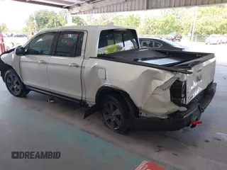 2020 Honda Ridgeline RTL-E with VIN 5FPYK3F71LB005028, listed as a IAAI auction lot 42167883 with 81,882 mi miles and . Bid and sale history available at DreamBid. Image 3.