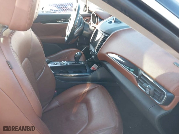 2017 Maserati Levante with VIN ZN661XUA1HX234457, listed as a IAAI auction lot 41029384 with 132,624 mi miles. Bid and sale history available at carsss.com. Image 5.