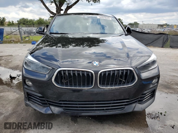 2020 BMW X2 sDrive28i with VIN WBXYH9C05L5R39182, listed as a Copart auction lot 56929605 with 87,253 mi miles and Non repairable. Bid and sale history available at DreamBid. Image 5.
