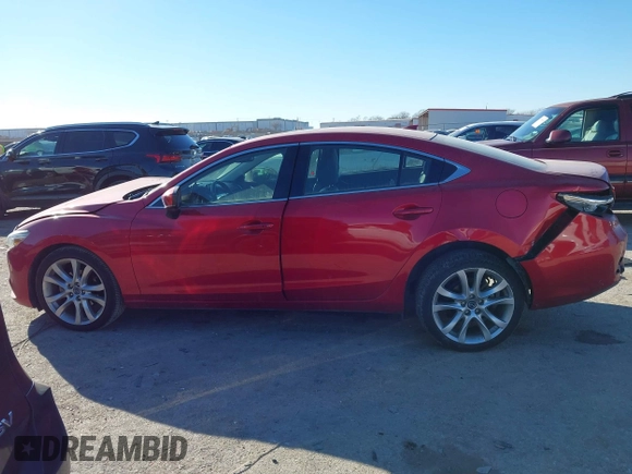 2017 Mazda 6 Touring with VIN JM1GL1V51H1126762, listed as a IAAI auction lot 41394606 with 62,072 mi miles and . Bid and sale history available at DreamBid. Image 14.