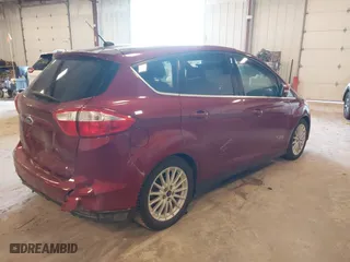 2015 Ford C-Max Energi SEL with VIN 1FADP5CU8FL101857, listed as a IAAI auction lot 41930615 with 148,579 mi miles. Bid and sale history available at carsss.com. Image 4.