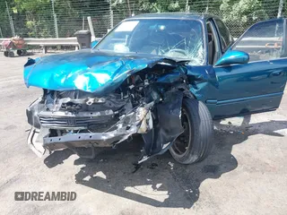 1997 Honda Civic LX z VIN 2HGEJ6671VH574878, wystawiony jako IAAI lot #42332735 z przebiegiem 246 181 mil mil oraz . Historia ofert i sprzedaży dostępna na DreamBid. Obrazek 6.
