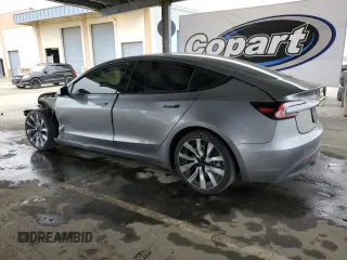 2024 Tesla Model 3 z VIN 5YJ3E1EA0RF859934, wystawiony jako Copart lot #52962285 z przebiegiem 32 329 mil mil oraz Szkoda całkowita • Salvage title. Historia ofert i sprzedaży dostępna na DreamBid. Obrazek 2.
