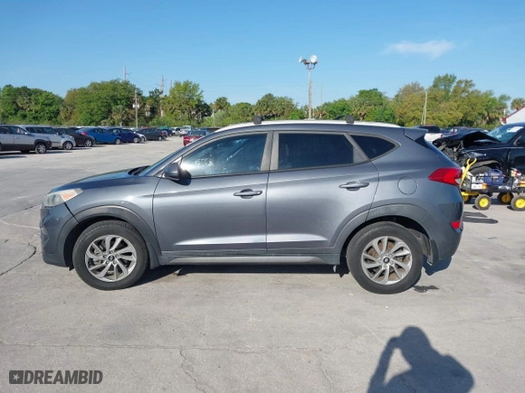2016 Hyundai Tucson SE with VIN KM8J33A44GU209299, listed as a IAAI auction lot 41793611 with 42,417 mi miles. Bid and sale history available at carsss.com. Image 14.