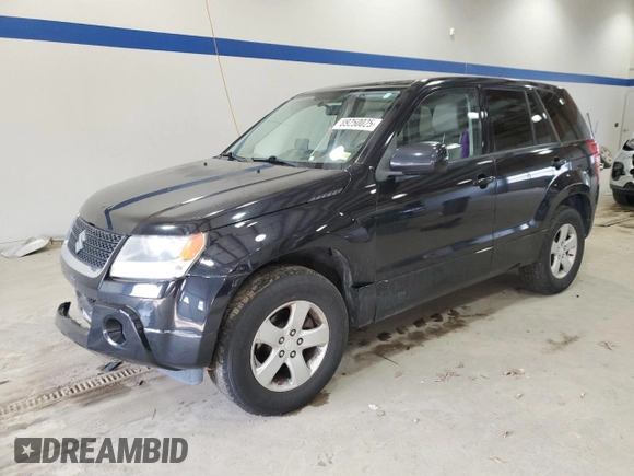 2012 Suzuki Grand Vitara Premium z VIN JS3TD0D66C4100814, wystawiony jako Copart lot #89250025 z przebiegiem 102 381 mil mil oraz Szkody całkowita. Historia ofert i sprzedaży dostępna na DreamBid. Obrazek 1.