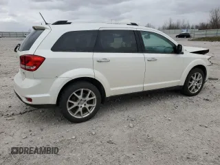 2014 Dodge Journey R/T with VIN 3C4PDDFG1ET176774, listed as a Copart auction lot 52140875 with 100,260 mi miles and Clean title. Bid and sale history available at DreamBid. Image 3.