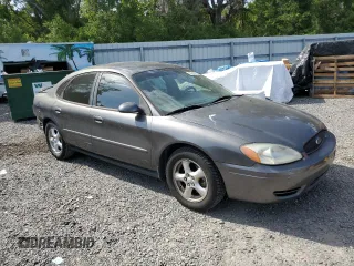 2004 Ford Taurus SE with VIN 1FAFP53U24A137741, listed as a Copart auction lot 54313915 with 92,739 mi miles and Salvage Title. Bid and sale history available at DreamBid. Image 4.