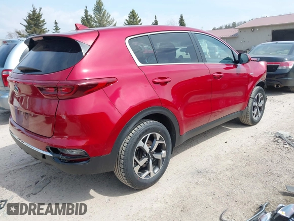 2021 Kia Sportage LX with VIN KNDPMCAC3M7901633, listed as a IAAI auction lot 42060511 with 89,816 mi miles and . Bid and sale history available at carsss.com. Image 4.
