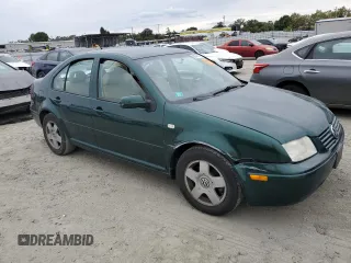 2000 Volkswagen Jetta z VIN 3VWSC29MXYM137048, wystawiony jako Copart lot #68948614 z przebiegiem 76 167 mil mil oraz Szkoda całkowita • Salvage title. Historia ofert i sprzedaży dostępna na DreamBid. Obrazek 4.