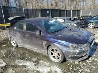 2014 Mitsubishi Lancer Evolution GSR with VIN JA32W8FV6EU010233, listed as a Copart auction lot 42787275 with 74,780 mi miles and Salvage Title. Bid and sale history available at carsss.com. Image 4.