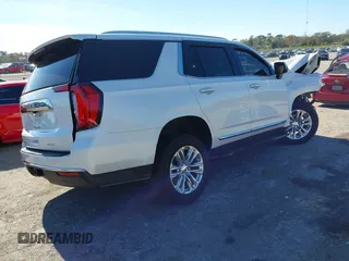 2022 GMC Yukon SLT with VIN 1GKS1BKT7NR329018, listed as a IAAI auction lot 41181065 with 50,551 mi miles. Bid and sale history available at carsss.com. Image 4.