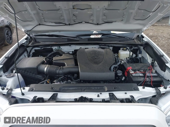 2023 Toyota Tacoma SR5 z VIN 3TMDZ5BN2PM144461, wystawiony jako IAAI lot #41565934 z przebiegiem 75 547 mil mil oraz . Historia ofert i sprzedaży dostępna na DreamBid. Obrazek 10.